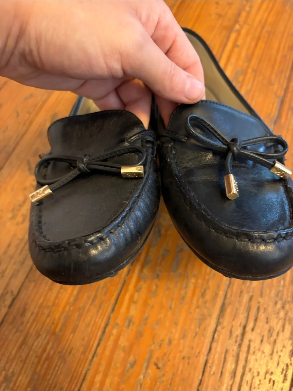 Michael Kors Black Leather Bow Loafers with Gold Accents